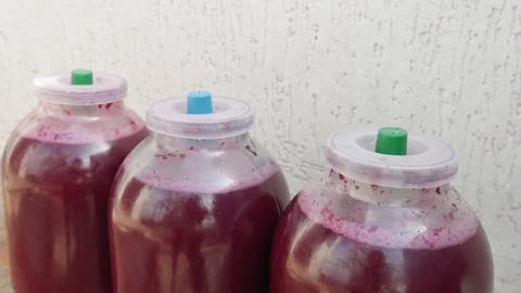 Process of Wine Fermentation in Three Banks, Foam and bubbles in Wine Stock Footage 117185207