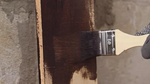 Process of wood coating with dark varnish. Handmade Video stock 334622673