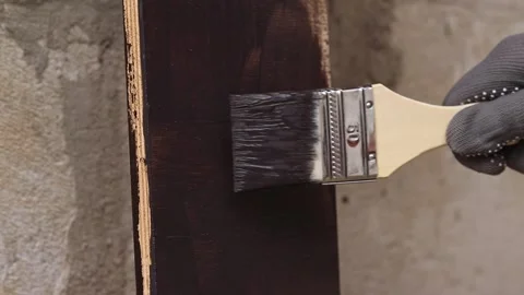 Process of wood coating with dark varnish. Handmade Stock-Footage 334622771