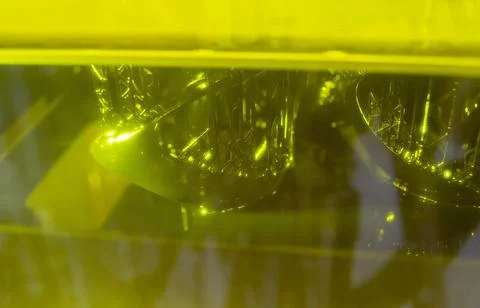 Process working 3D printer close-up. 3D printing from liquid material close-up. Stock Photos