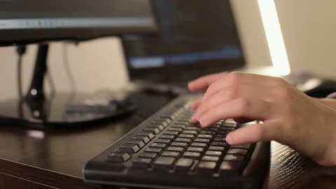 The process of working at the computer. Hands typing on the keyboard. The progra 스톡 동영상 129434476