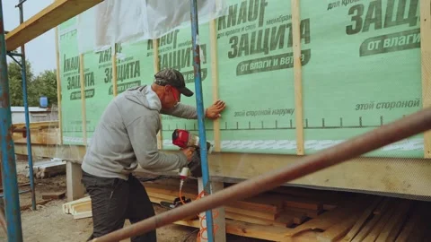 The process of working with a construction gun Stock Footage 344696523