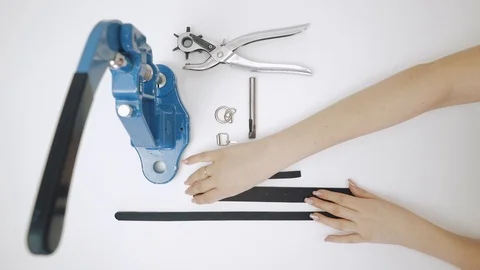 Process of working with leather product. Preparation of product. Isolated Stock Footage 105093906