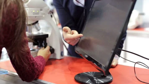 Process of working with a microscope in the laboratory Stock Footage 85522856