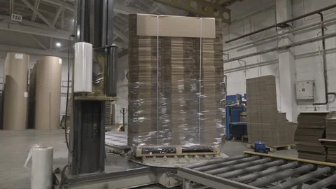 Process of wrapping box with film for easy material storage 動画素材 296577225