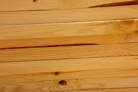 Processed boards at a sawmill. Smooth, turned, polished boards at a wood proc Stock Photos