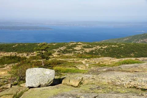 Processed by: Helicon Filter; Bright day on the hilltop overlooking lake with Stock Photos