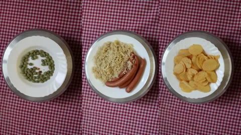 Processed junk food comparison on plates Stock Footage 340220552