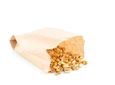 Processed peanuts in paper bag over white background Stock Photos