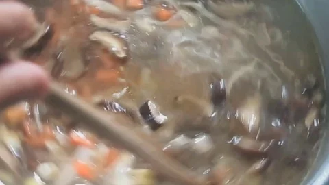 Processed rice and vegetable soup Stock Footage 70572475