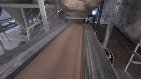Processed soil going into conveyor line Stock Footage 283428457