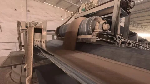 Processed soil going into conveyor line Stock Footage 283428482