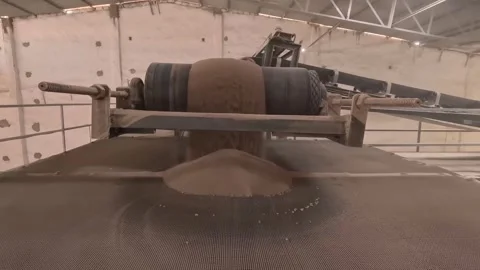 Processed soil going into conveyor line Stock Footage 283428490