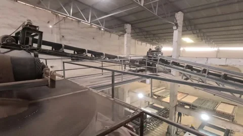 Processed soil going into conveyor line Stock Footage 283428498