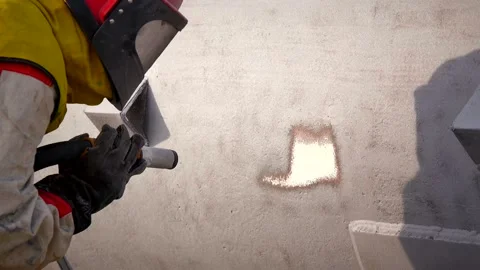 Processes metal with a stream of sand Video stock 142497336