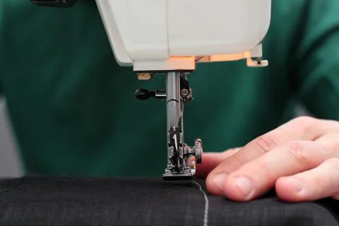 Processes of sewing Linum on the sewing machine sew women's hands sewing mach Stock Photos