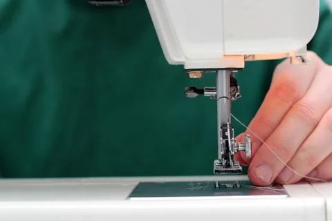 Processes of sewing Linum on the sewing machine sew women's hands sewing mach Stock Photos