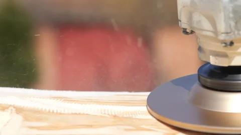 Processing of the ash trunk with a grinding wheel. Sawdust flies in different Stock Footage 330547696