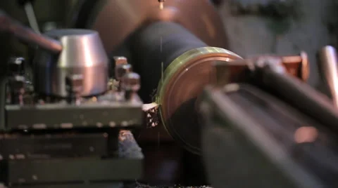 Processing blade spinning metal workpiece on machine with coolant Stock Footage 65302172