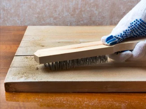 Processing the board with a metal brush. Photos