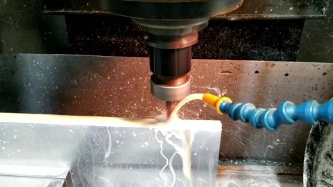 Processing of bronze blanks on a multi-purpose CNC machine Stock Footage 154856715
