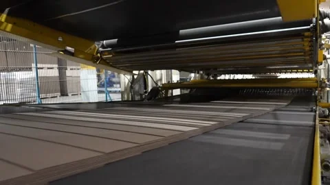 Processing cardboard in a paper mill close-up Video stock 296086697