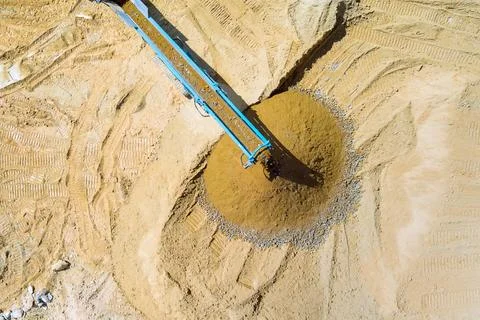 Processing crushed cone type rock crusher, conveying granite gravel stone in a Stock Photos