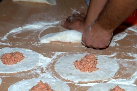 The processing of the dough to make panzerotti. Stock Photos