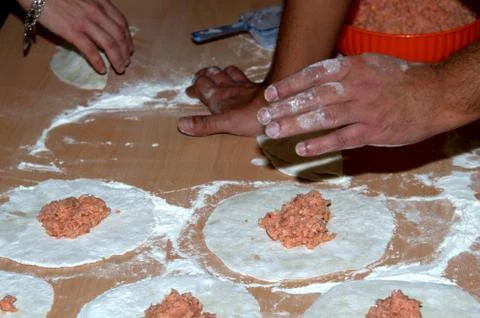 The processing of the dough to make panzerotti. Stock Photos
