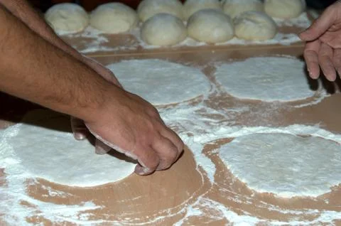 The processing of the dough. Stock Photos