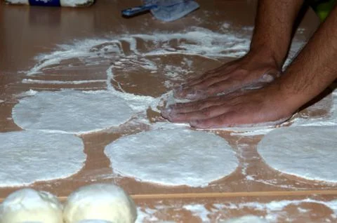 The processing of the dough. Stock Photos