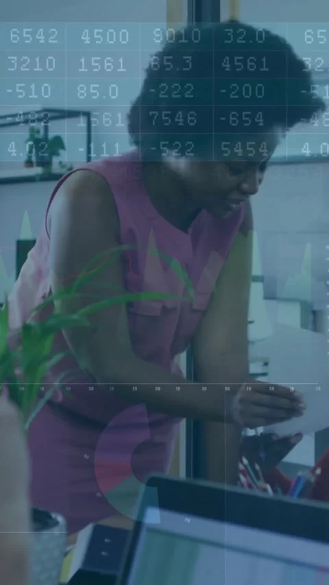 Processing financial data, diverse business people collaborating in office Stock Footage 344693921