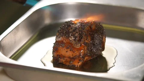 Processing of a fish roll with manual cooking burner, close-up in restaurant Stock Footage 86660242