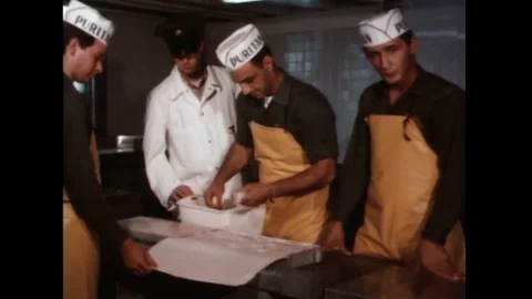 Processing fish for U.S. troop mealtime - 1967 Video stock 92684589