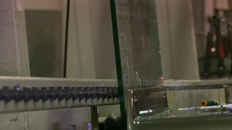 Processing of glass edge, factory of processing of sheet glass on the machines Stock Footage 76463379