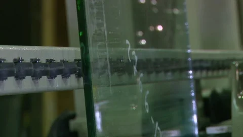 Processing of glass edge, factory of processing of sheet glass on the machines Stock Footage 76463404