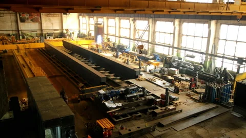 Processing huge details on ground at production plant Stock Footage 211991411