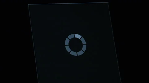 Processing icon on black computer screen Stock Footage 67553533