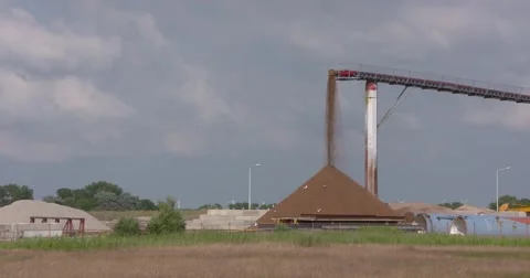 Processing of industrial sand and grid extracted from the Wadden Sea Stock Footage 64580010
