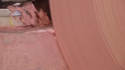 Processing lard or meat in minced meat Stockbeeldmateriaal 99490344