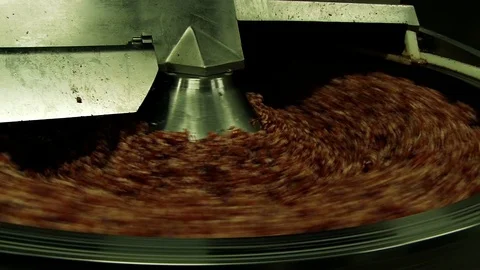 Processing lard or meat in minced meat on a huge meat grinder at a meat factory  Stock Footage 106227839