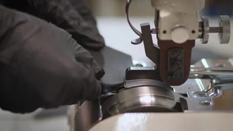 Processing of leather on a machine for making a wallet Stock Footage 266139157