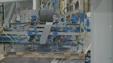 Processing machine (cnc) handling metal sheet Stock Footage 101960153