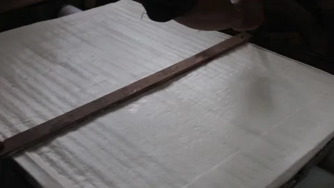 Processing of making tofu. an Indonesian man makes tofu the traditional way. Stock Footage 214234376