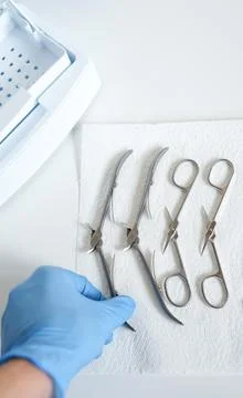 Processing manicure tools before sterilization Stock Photos