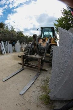 Processing of marble in the quarry. Stock Photos
