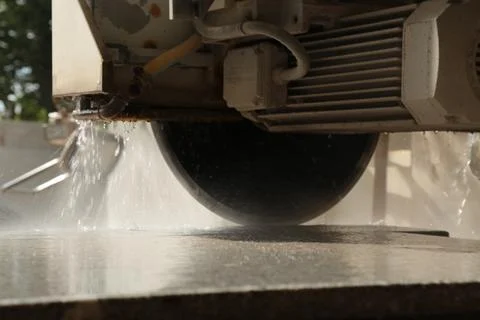 Processing of marble in the quarry. Stock Photos