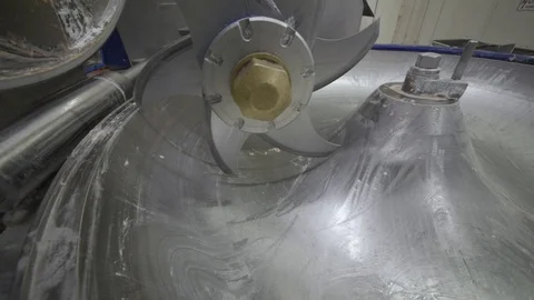 Processing of meat in the food industry on a cutter Stock Footage 99552057