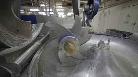 Processing of meat in the food industry on a cutter Stock-Footage 100532458