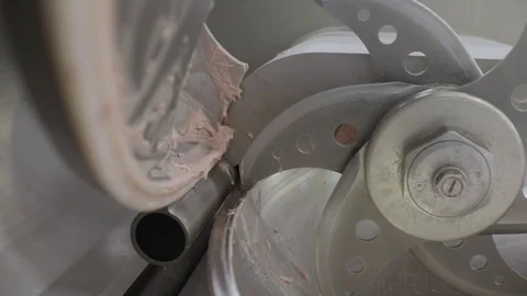 Processing of meat in the food industry on a cutter Stock-Footage 101440153